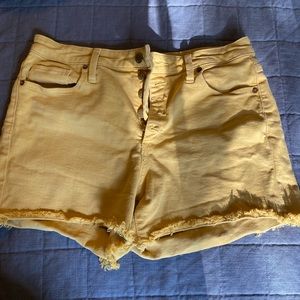 Golden Yellow denim shorts , frayed edges
